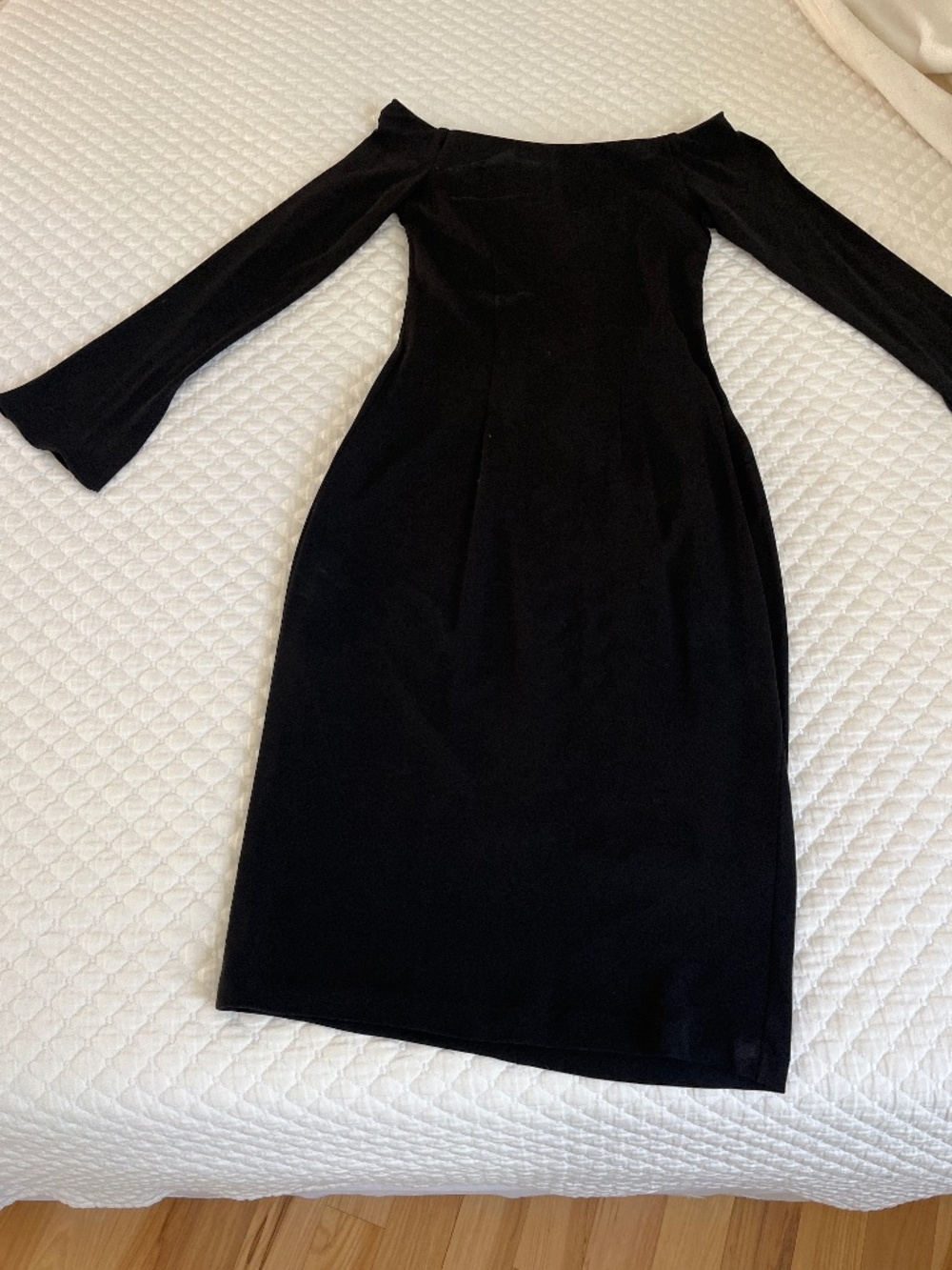 Off the shoulder Classic black dress.
